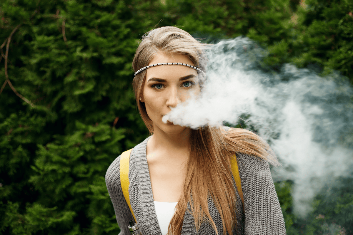 Girl Outdoors Vaping Cloud 8