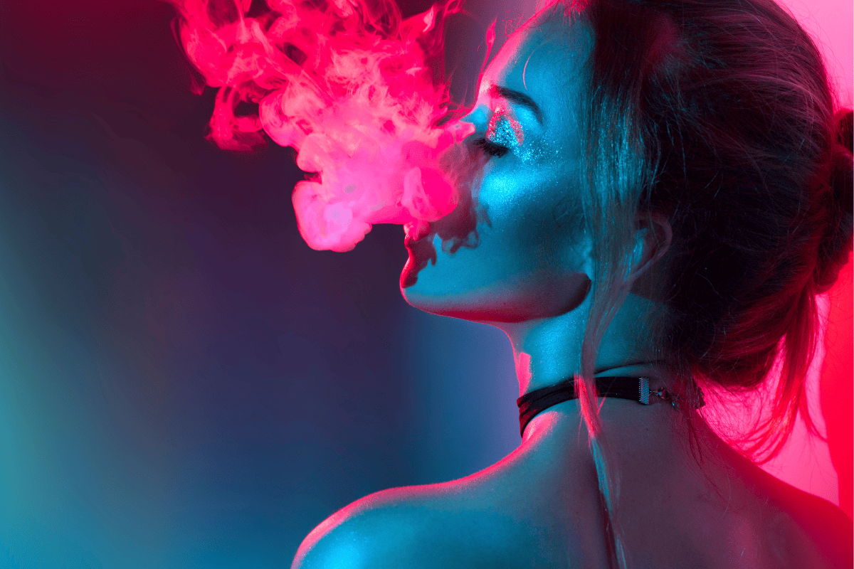 Pretty Woman Vaping with Vibrant Colors